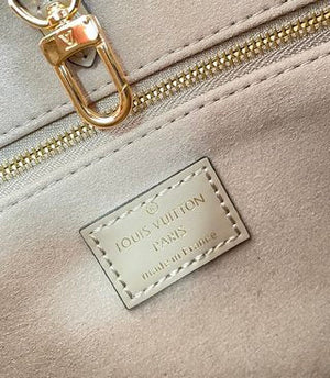 Pre-Loved LOUIS VUITTON Empreinte Monogram Giant Onthego PM Tourterelle Creme - SMY Digital