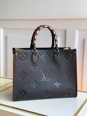 Pre-Loved LOUIS VUITTON Empreinte Monogram Giant Wild At Heart Onthego MM - SMY Digital