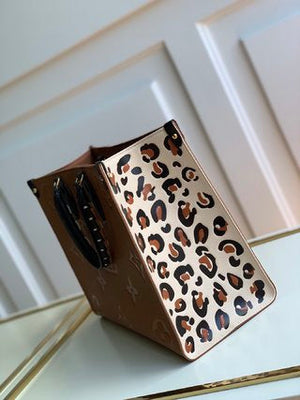 Pre-Loved LOUIS VUITTON Empreinte Monogram Giant Wild At Heart Onthego MM - SMY Digital
