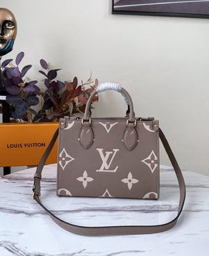 Pre-Loved LOUIS VUITTON Empreinte Monogram Giant Onthego MM Black - SMY Digital