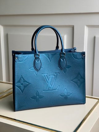 Pre-Loved LOUIS VUITTON Empreinte Monogram Giant Onthego PM Tourterelle Creme - SMY Digital