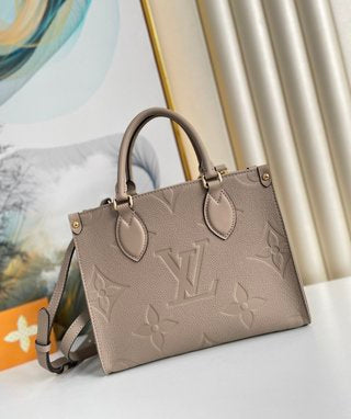 Pre-Loved LOUIS VUITTON Empreinte Monogram Giant Onthego PM Tourterelle Creme - SMY Digital