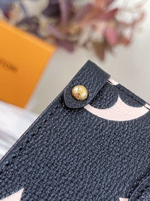 Pre-Loved LOUIS VUITTON Empreinte Monogram Giant Onthego MM Black - SMY Digital