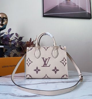 Pre-Loved LOUIS VUITTON Empreinte Monogram Giant Onthego MM Black - SMY Digital