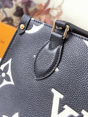 Pre-Loved LOUIS VUITTON Empreinte Monogram Giant Onthego MM Black - SMY Digital